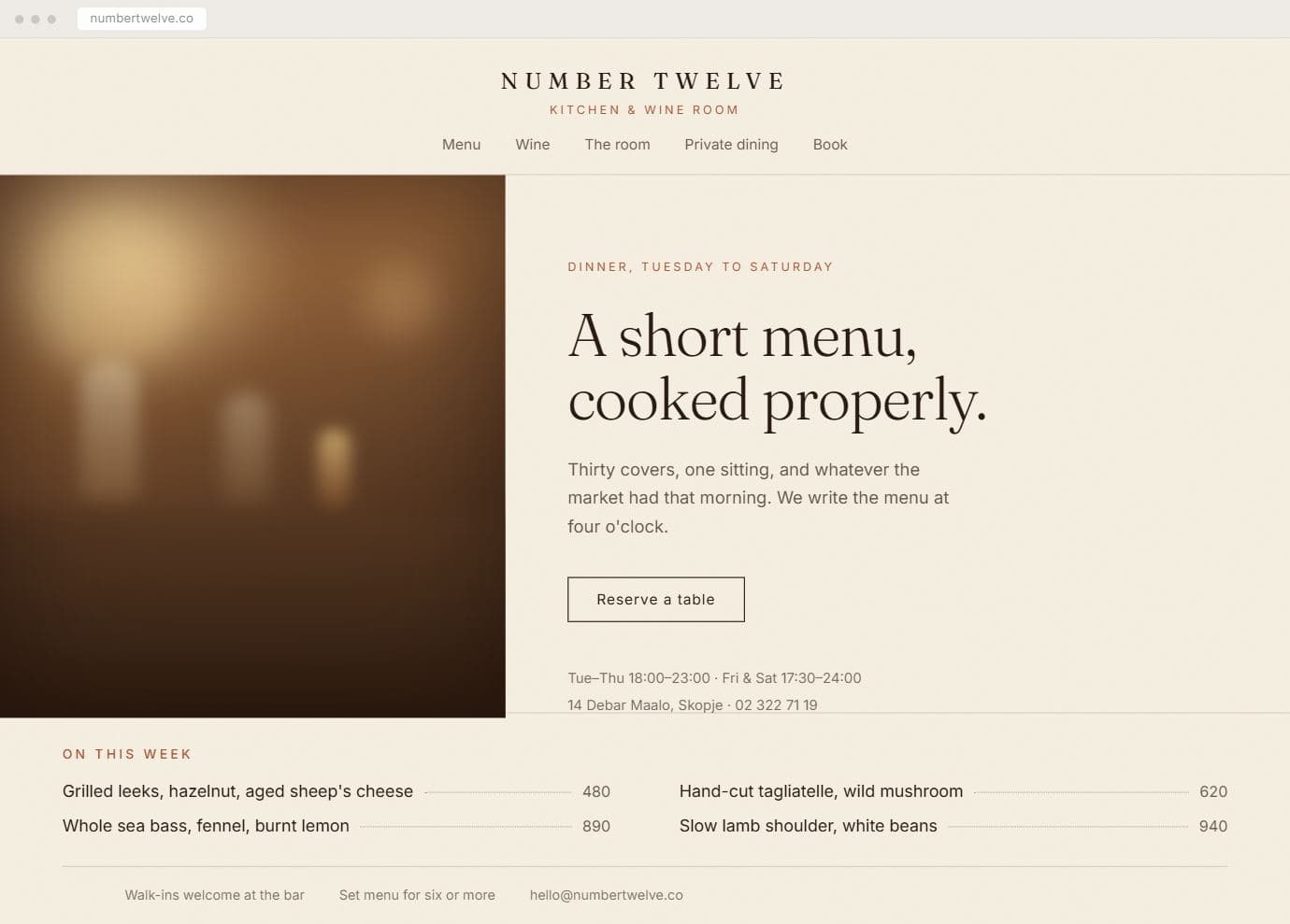 The Long Table restaurant website: a centred serif wordmark, a warm photograph of a candlelit table, the headline “A short menu, cooked properly”, and this week's dishes with prices.